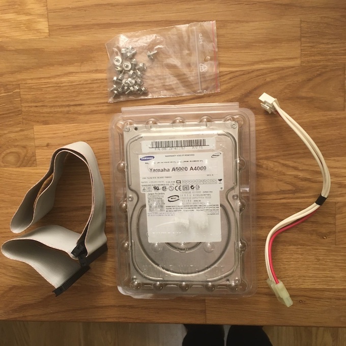 Photo of an IDE hard disk and cables